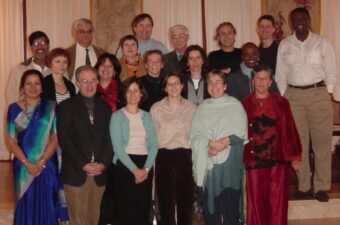 Image from 2003 of the New Tactics symposium planning working group, including Doug and Nancy