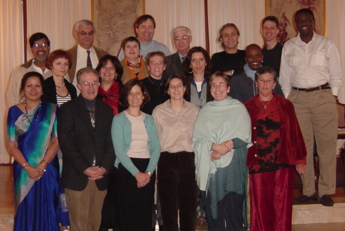 Image from 2003 of the New Tactics symposium planning working group, including Doug and Nancy