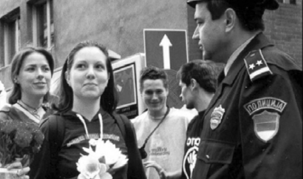 Optor students smiling face to face with the police.